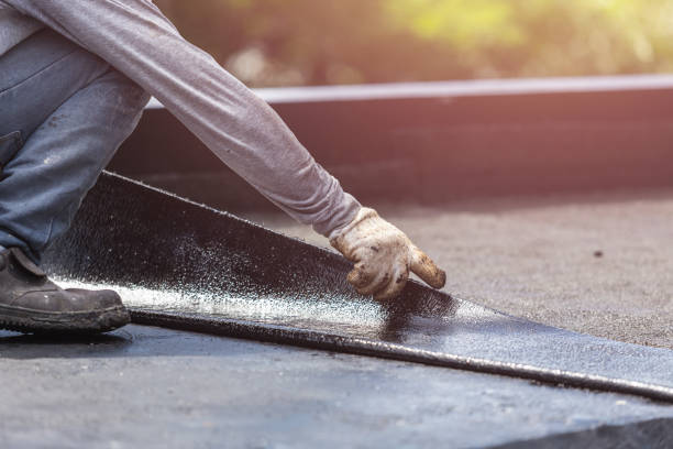 Professional Emergency Waterproofing technician working in Roslyn, NY